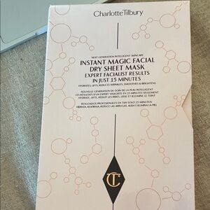 Charlotte Tilbury Instant Magic Facial Dry Sheet Mask - Cream and Black